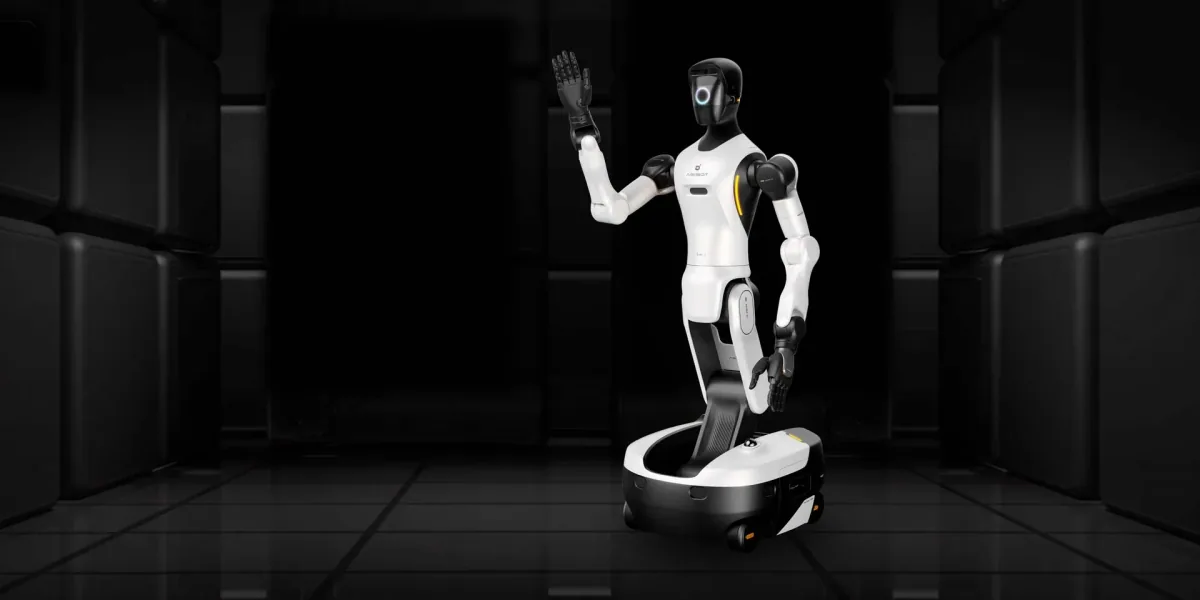 The wheeled AGIBOT G2 humanoid robot in a darkened hall